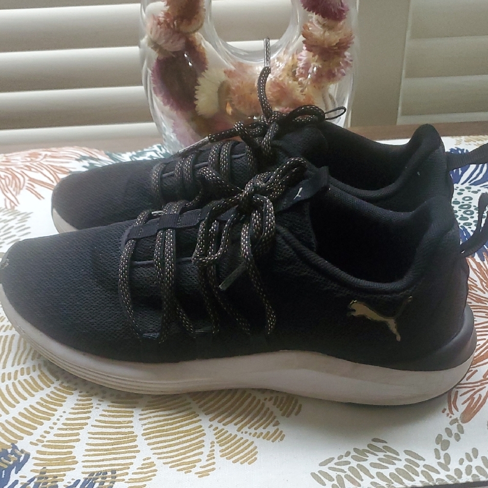 Puma Black Sneakers with Gold Accents